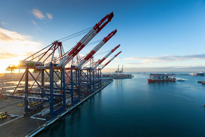 A beautiful shot of the sun rising on the Port of Long Beach. The city